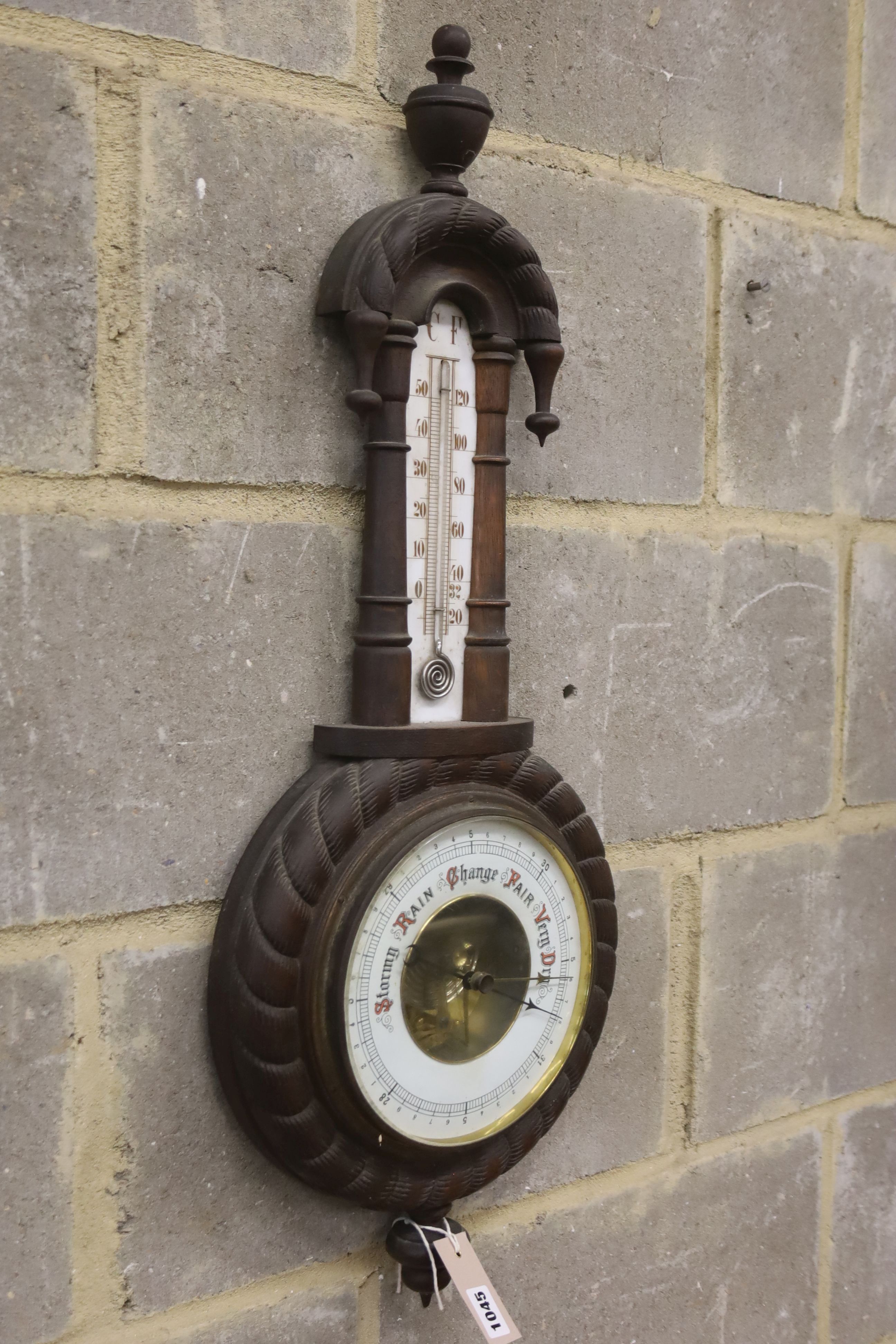A late Victorian aneroid barometer / thermometer, height 76cm